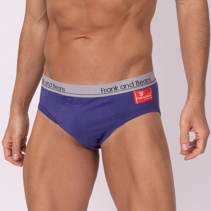 Model in purple mens cotton briefs front view on white light grey background